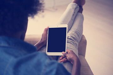 Image showing african american woman at home with digital tablet