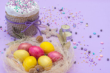 Image showing horizontal photo of the compilation for Easter with cake and painted eggs