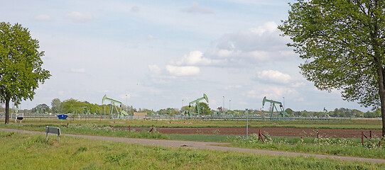 Image showing Landscape with oil pump jack