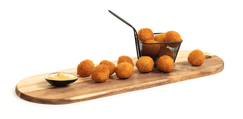 Image showing Dutch traditional snack bitterbal on a serving board