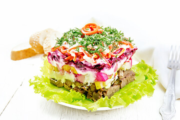 Image showing Salad with beef and vegetables on white board