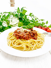 Image showing Spaghetti with bolognese on wooden board