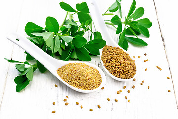 Image showing Fenugreek in two spoons with leaves on board