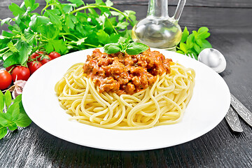 Image showing Spaghetti with bolognese on black board