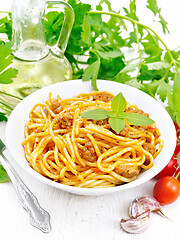 Image showing Spaghetti with bolognese in plate on light board