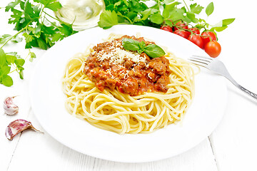 Image showing Spaghetti with bolognese on board