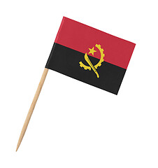 Image showing Small paper Angolan flag on wooden stick