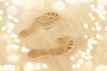 Image showing footprints in sand on summer beach