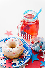 Image showing donut with juice and candies on independence day