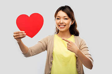 Image showing happy asian woman with red heart