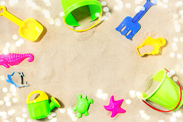 Image showing close up of sand toys kit on summer beach