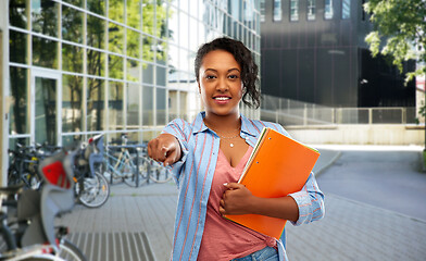 Image showing african american student woman with notebooks