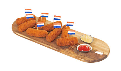 Image showing Brown crusty dutch kroketten on a serving tray isolated 