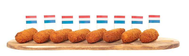 Image showing Brown crusty dutch kroketten on a serving tray isolated 