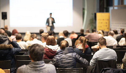 Image showing Business speaker giving a talk at business conference event.