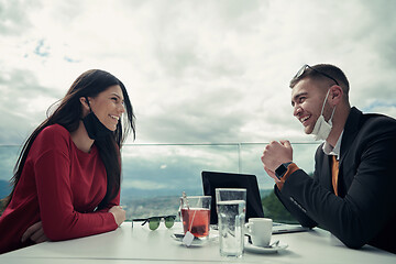 Image showing business people wearing protective mask