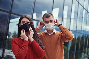 Image showing business team with protective medical mask