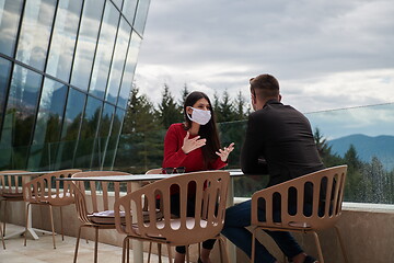 Image showing business people wearing protective mask