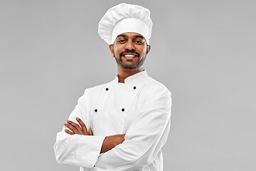 Image showing happy male indian chef in toque