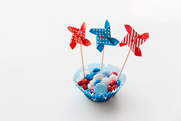 Image showing candies with pinwheel toys on independence day