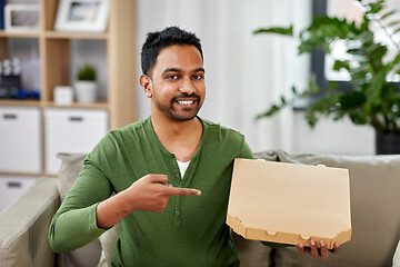 Image showing indian man with box of takeaway pizza at home