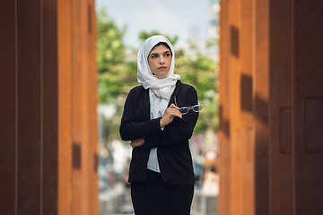 Image showing Beautiful muslim successful businesswoman portrait, confident happy CEO