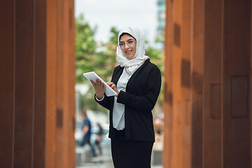 Image showing Beautiful muslim successful businesswoman portrait, confident happy CEO