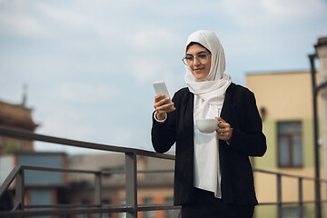 Image showing Beautiful muslim successful businesswoman portrait, confident happy CEO