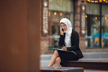 Image showing Beautiful muslim successful businesswoman portrait, confident happy CEO