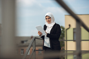 Image showing Beautiful muslim successful businesswoman portrait, confident happy CEO