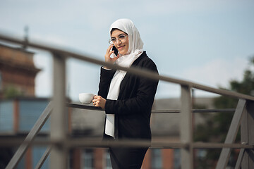 Image showing Beautiful muslim successful businesswoman portrait, confident happy CEO