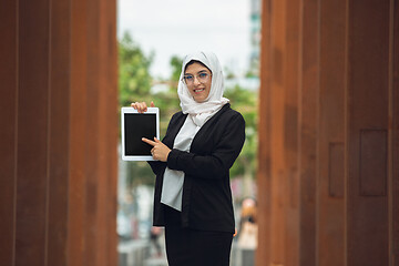 Image showing Beautiful muslim successful businesswoman portrait, confident happy CEO