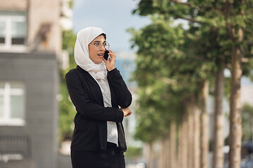 Image showing Beautiful muslim successful businesswoman portrait, confident happy CEO