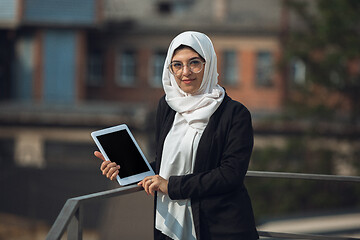 Image showing Beautiful muslim successful businesswoman portrait, confident happy CEO