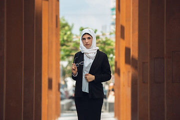 Image showing Beautiful muslim successful businesswoman portrait, confident happy CEO