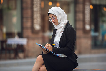 Image showing Beautiful muslim successful businesswoman portrait, confident happy CEO