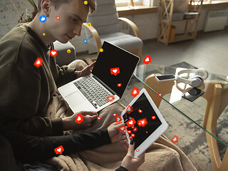 Image showing Friends connecting and sharing social media. Modern UI icons, communication, devices