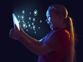 Image showing Girl connecting and sharing social media. Modern UI icons, communication, devices