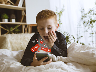 Image showing Boy connecting and sharing social media. Modern UI icons, communication, devices