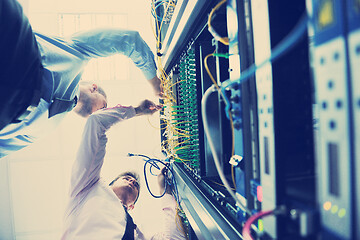 Image showing it engineers in network server room