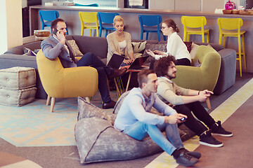 Image showing startup Office Workers Playing computer games