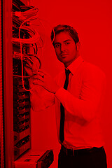 Image showing young it engineer in datacenter server room