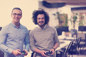 Image showing startup Office Workers Playing computer games