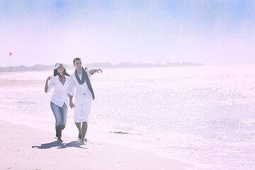 Image showing happy young couple have fun at beautiful beach