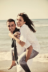 Image showing happy young couple have fun at beautiful beach