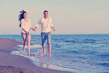 Image showing young couple  on beach have fun