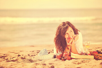 Image showing happy young woman on beach