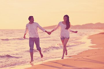 Image showing young couple  on beach have fun