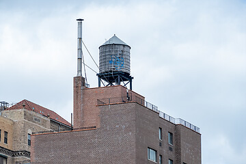 Image showing typical water tank on the roof of a building in New York City