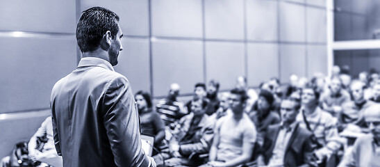 Image showing Public speaker giving talk at business event.